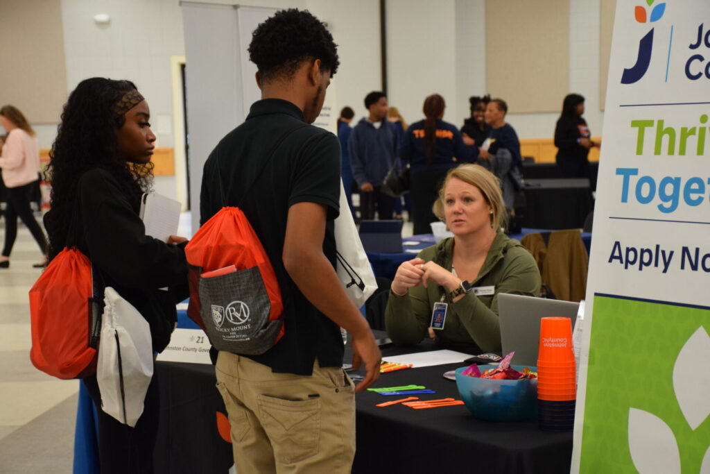 Photo of Job Seekers speaking with vendors