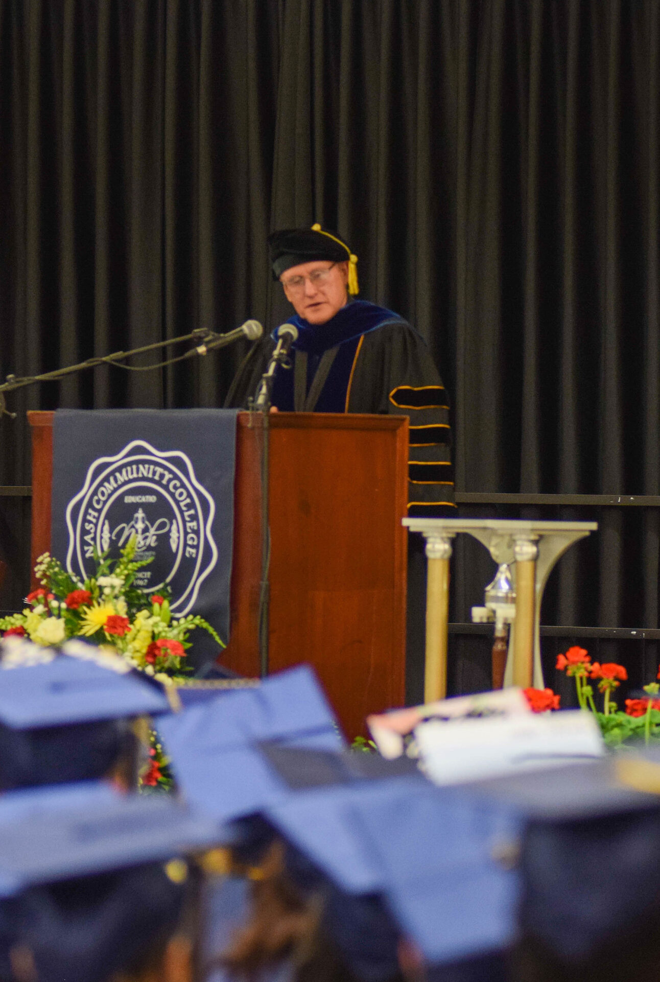 President of Nash Community College deliver speech to graduating students.