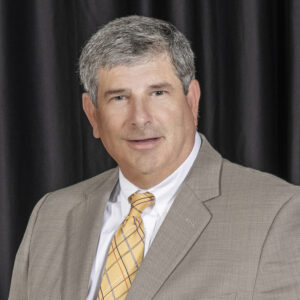 Headshot of Board of Trustees member, Russell Proctor